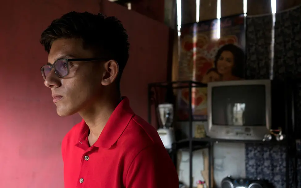 Als 9-Jähriger versuchte seine Mutter mit ihm Honduras zu verlassen | © UNICEF/Bindra Honduras: Eric in seinem Zuhause