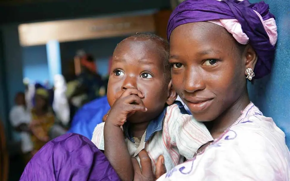 Eine Mutter mit ihrem Kind © UNICEF/Pirozzi