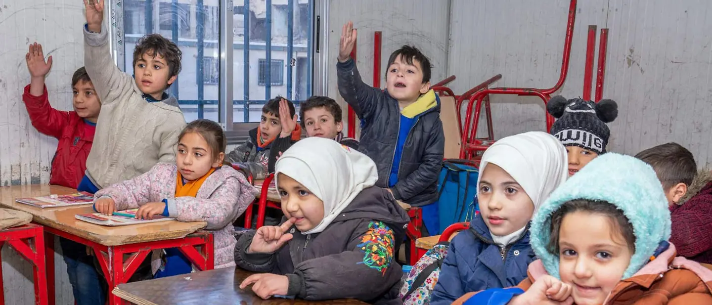 Syrien spenden: Syrische Schulkinder in Aleppo in einer von UNICEF sanierten Schule 