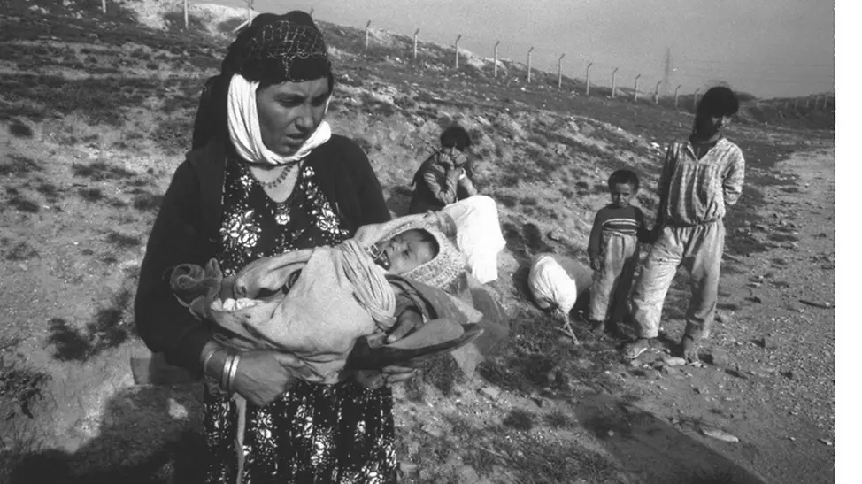 Eine Familie im Irak, 1991. | © UNICEF/Isaac UNICEF 80 Jahre Fotos: Eine Familie im Irak, 1991.